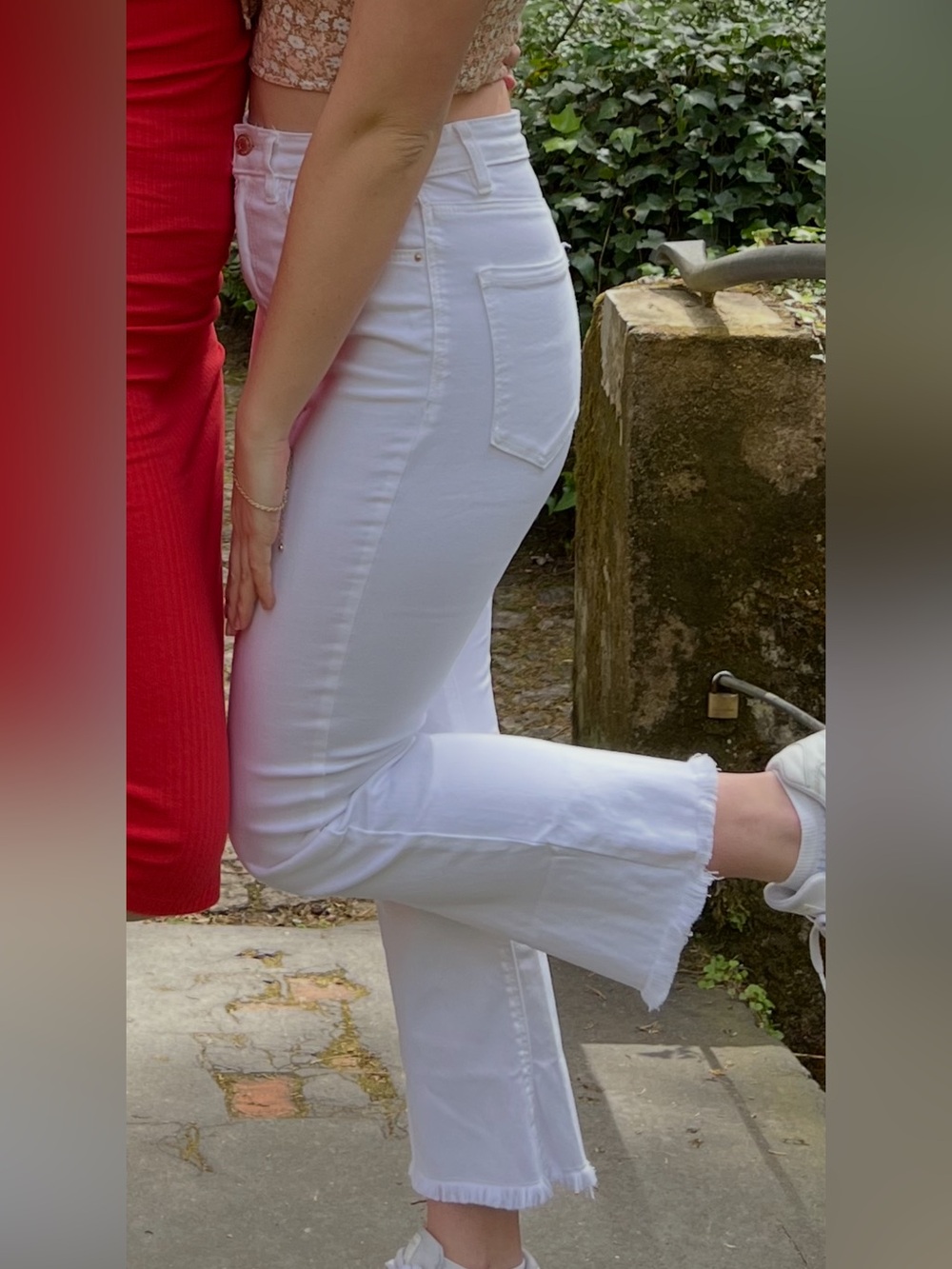 Estradivarius White Flared Jeans with Raw Hem